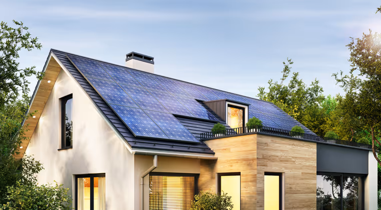 Modern house with roof terrace and solar panels