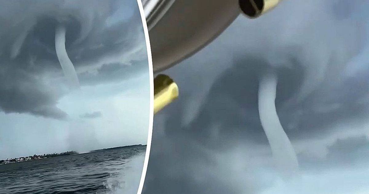Schaurige-Szenen-Familie-auf-Boot-flieht-vor-Wasserhose