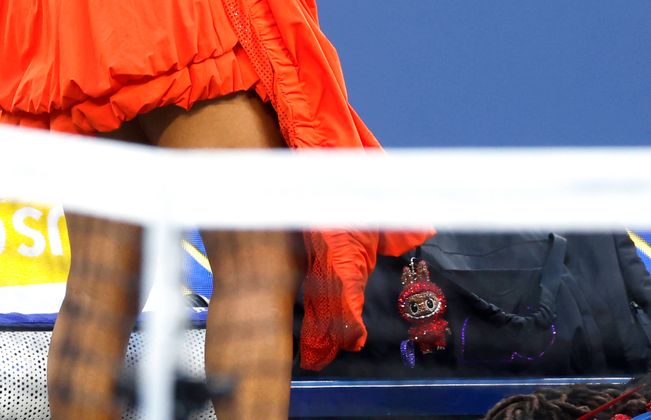 ...und auch den Labubus, die sie immer an ihrer Tasche trug.