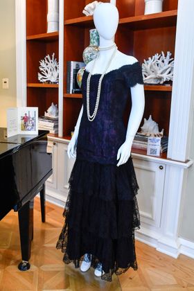Princess Diana's 1987 Victor Edelstein magenta silk and lace evening dress is displayed during Julien's Auctions' press preview of "Princess Diana's Elegance & a Royal Collection", ahead of an exclusive private showing at the Peninsula Beverly Hills, Beverly Hills, California, June 25, 2024. (Photo by VALERIE MACON / AFP)