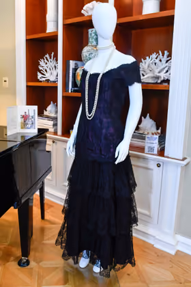 Princess Diana's 1987 Victor Edelstein magenta silk and lace evening dress is displayed during Julien's Auctions' press preview of "Princess Diana's Elegance & a Royal Collection", ahead of an exclusive private showing at the Peninsula Beverly Hills, Beverly Hills, California, June 25, 2024. (Photo by VALERIE MACON / AFP)